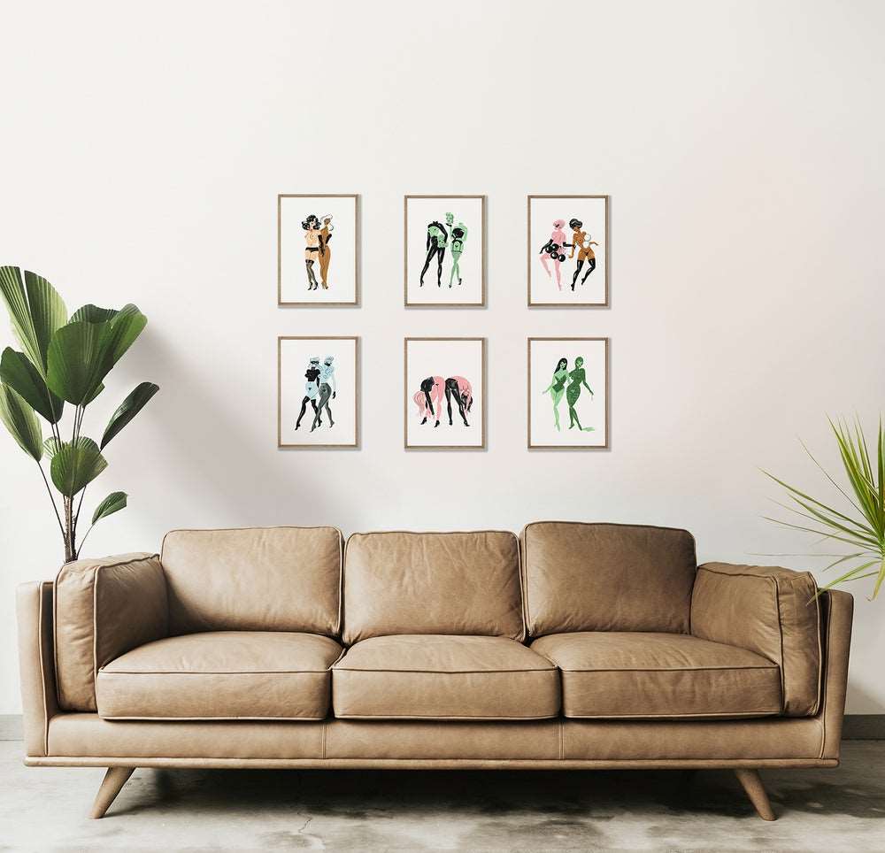 Lounge room sofa with framed salon art hang. Limited edition prints by Neryl Walker.